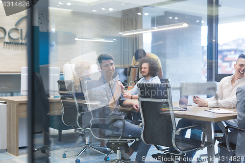 Image of Startup Business Team At A Meeting at modern office building