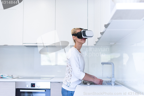 Image of woman using VR-headset glasses of virtual reality