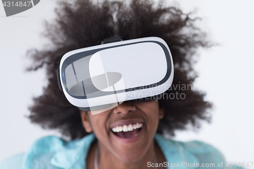 Image of black girl using VR headset glasses of virtual reality