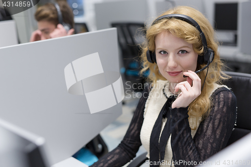 Image of female call centre operator doing her job