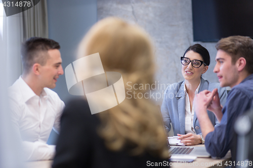 Image of Startup Business Team At A Meeting at modern office building