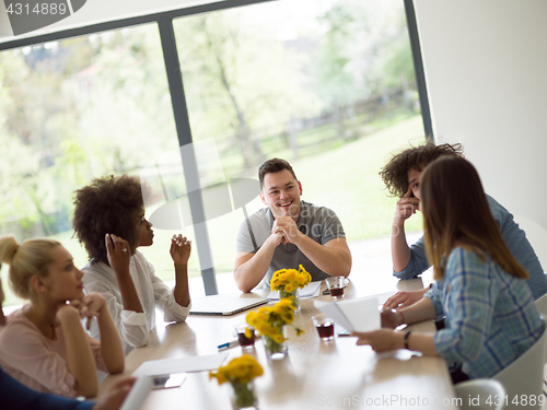 Image of Multiethnic startup Business Team At A Meeting at modern office 