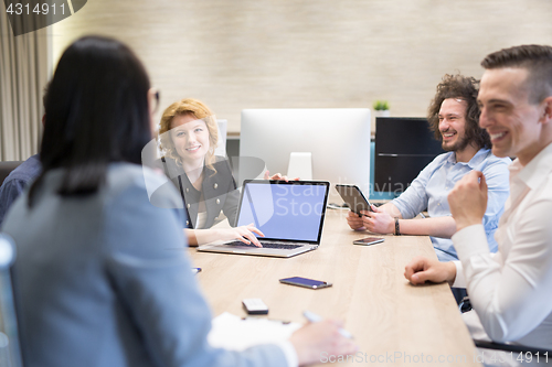 Image of Startup Business Team At A Meeting at modern office building