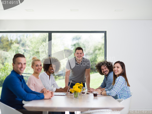 Image of Multiethnic startup Business Team At A Meeting at modern office 