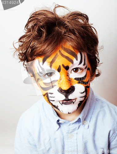 Image of little cute boy with faceart on birthday party close up, little 