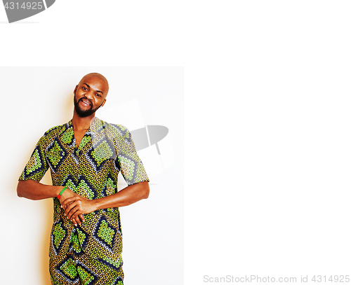 Image of portrait of young handsome african man wearing bright green nati