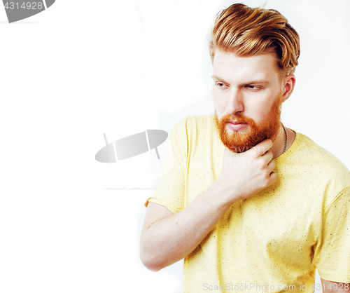 Image of young handsome hipster ginger bearded guy looking brutal isolate