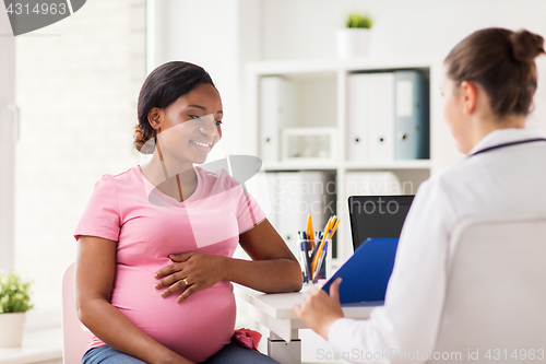 Image of gynecologist and pregnant woman at hospital