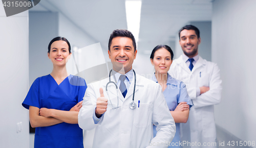 Image of medics or doctors at hospital showing thumbs up
