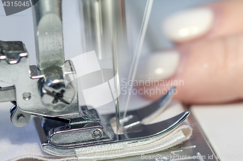 Image of sewing machine and the needle