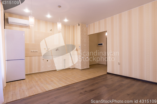 Image of Interior of studio apartment, entrance to room and kitchen without a headset