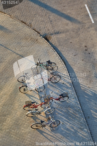 Image of Bicycles stand on a street