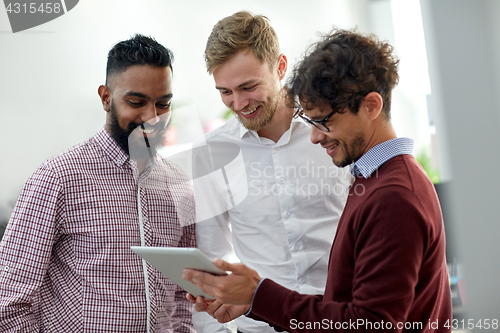 Image of business team with tablet pc at office