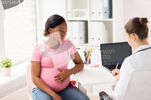Image of gynecologist doctor and pregnant woman at hospital