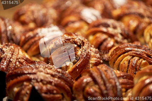 Image of close up of buns or pies at bakery