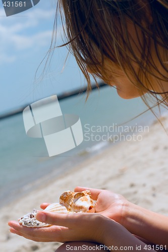 Image of girl with shells