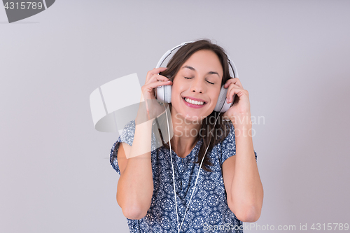 Image of woman with headphones isolated on a white