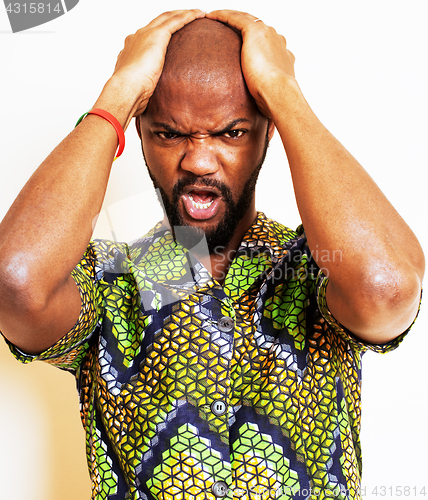 Image of portrait of young handsome african man wearing bright green nati