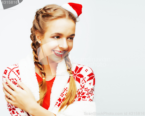 Image of young pretty happy smiling blond woman on christmas in santas re