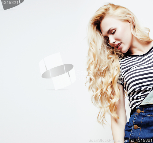 Image of young pretty teenage hipster girl posing emotional happy smiling on white background, lifestyle people concept 