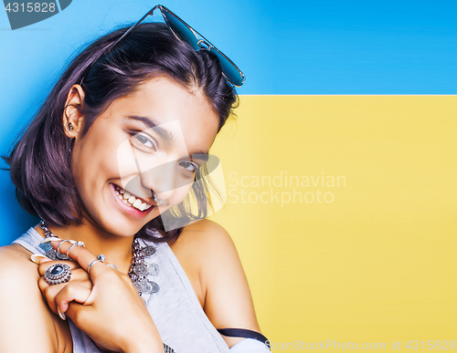 Image of lifestyle people concept. young pretty smiling indian girl with long nails wearing lot of jewelry rings, asian summer happy cool  copyspace