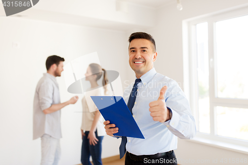 Image of realtor with clipboard showing thumbs up