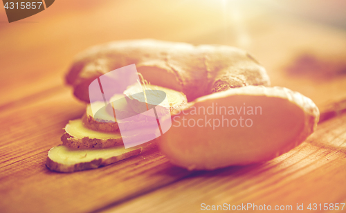 Image of close up of ginger root on wooden table