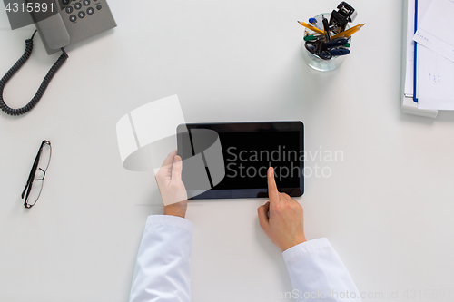 Image of doctor hands with tablet pc at clinic