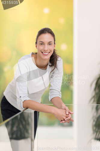 Image of portrait of a young beautiful woman at home