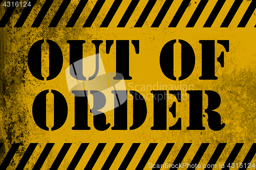 Image of Out of order sign yellow with stripes