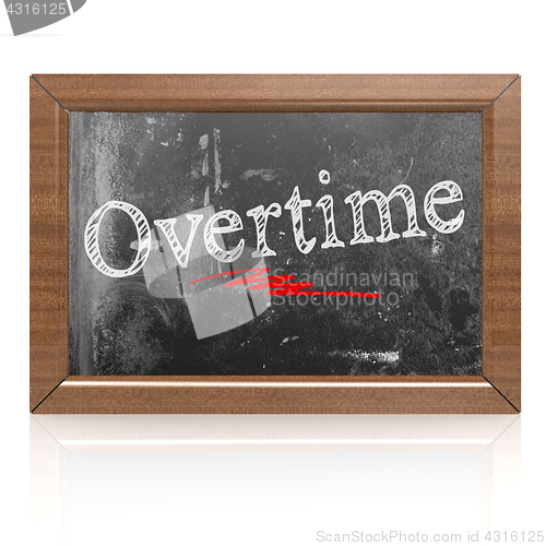 Image of Overtime text written on blackboard