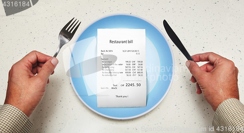 Image of bill on empty plate for visitor