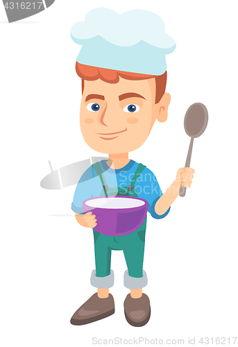 Image of Caucasian boy holding a saucepan and a spoon.
