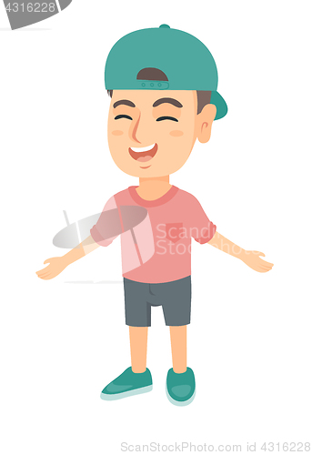 Image of Caucasian cheerful boy in a cap laughing.