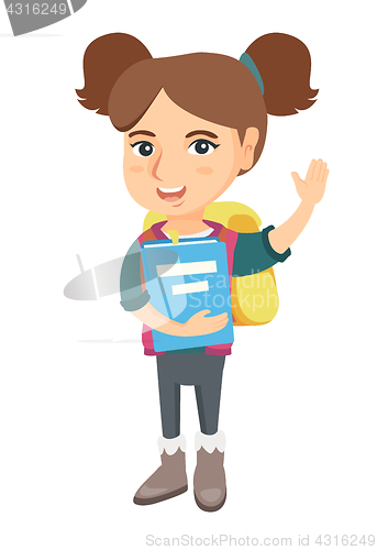 Image of Schoolgirl holding a book and waving her hand.