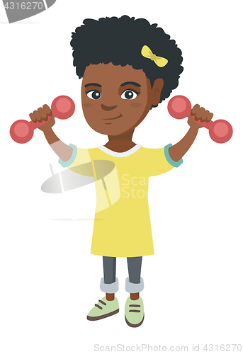 Image of Little smiling african girl holding dumbbells.