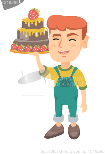 Image of Little caucasian boy holding a chocolate cake.