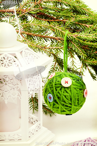 Image of Christmas toy green ball, retro toned