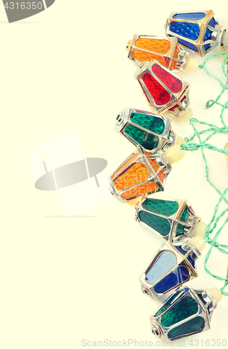Image of Retro style christmas lights with copy space, retro toned