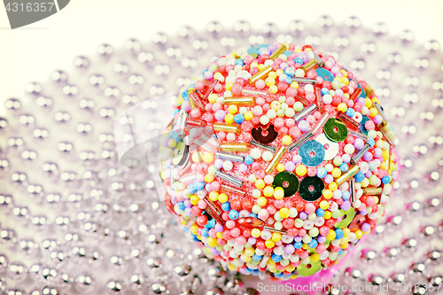 Image of Multicolored christmas ball, retro toned