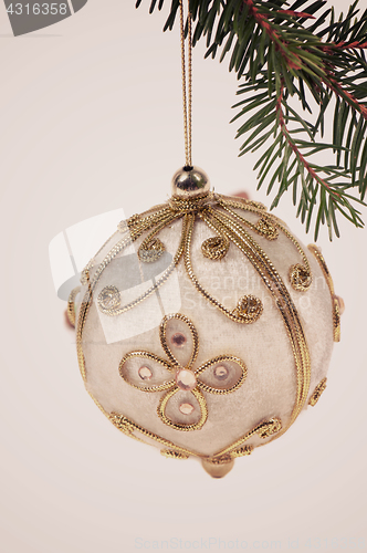 Image of Christmas toy white ball, retro toned