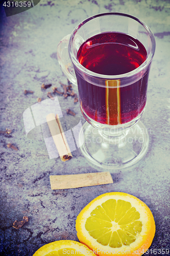 Image of Red mulled wine with spices, retro toned