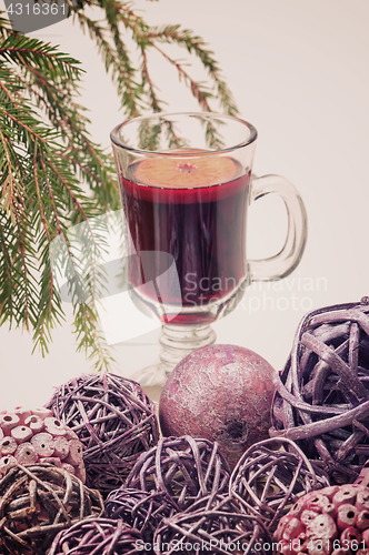 Image of Red mulled wine and xmas decorations, retro toned