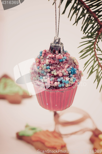 Image of Christmas retro tree cupcake toy, retro toned