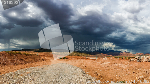 Image of Ominous Stormy Sky and Cumulus Clouds with Rain in the Desert