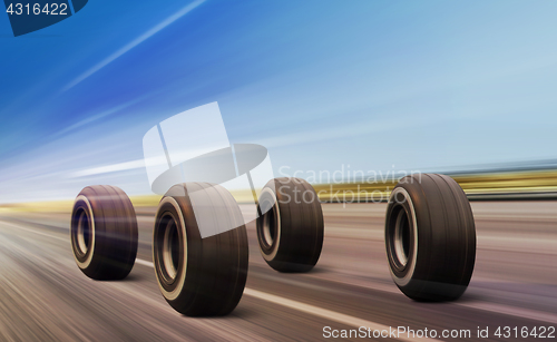 Image of wheels moving on road