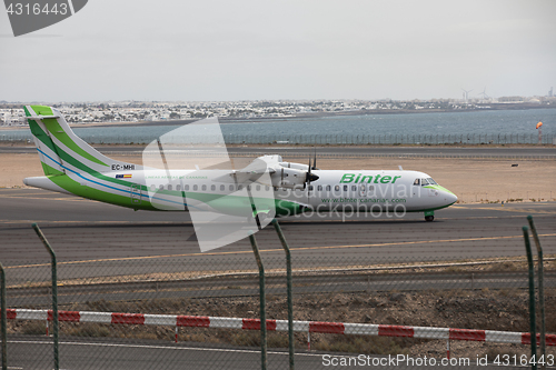 Image of ARECIFE, SPAIN - APRIL, 15 2017: ATR 72 of Binter ready to take 