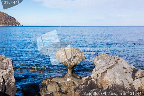 Image of Kannesteinen is a special shaped stone located on the shore of O