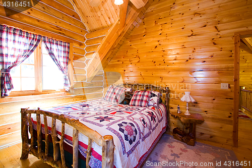 Image of Close up on a Bedroom in a Cabin