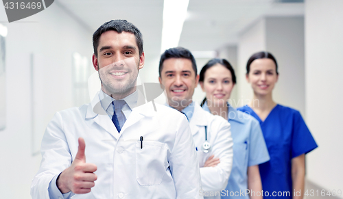 Image of medics or doctors at hospital showing thumbs up